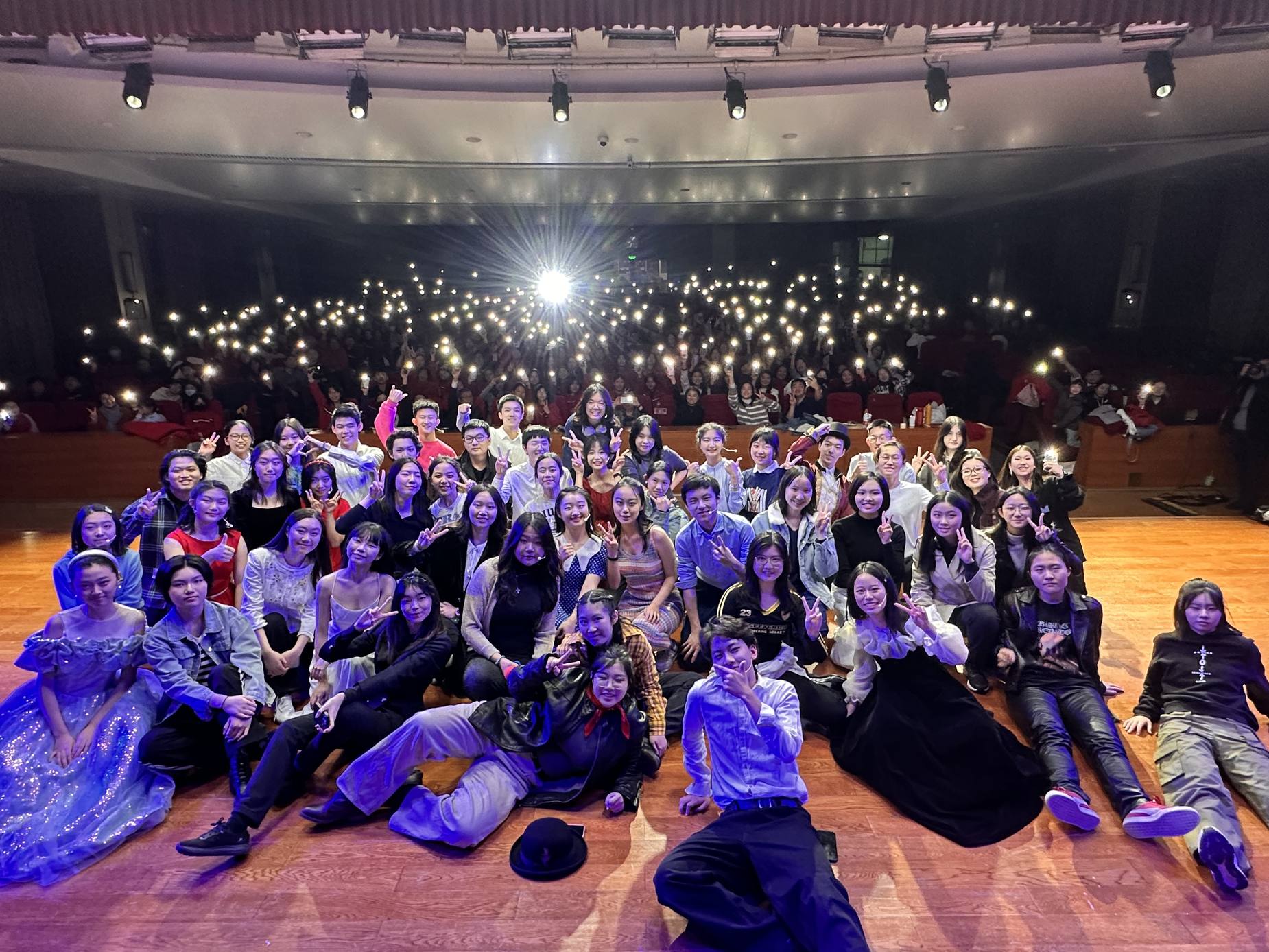Musical theatre cast on stage